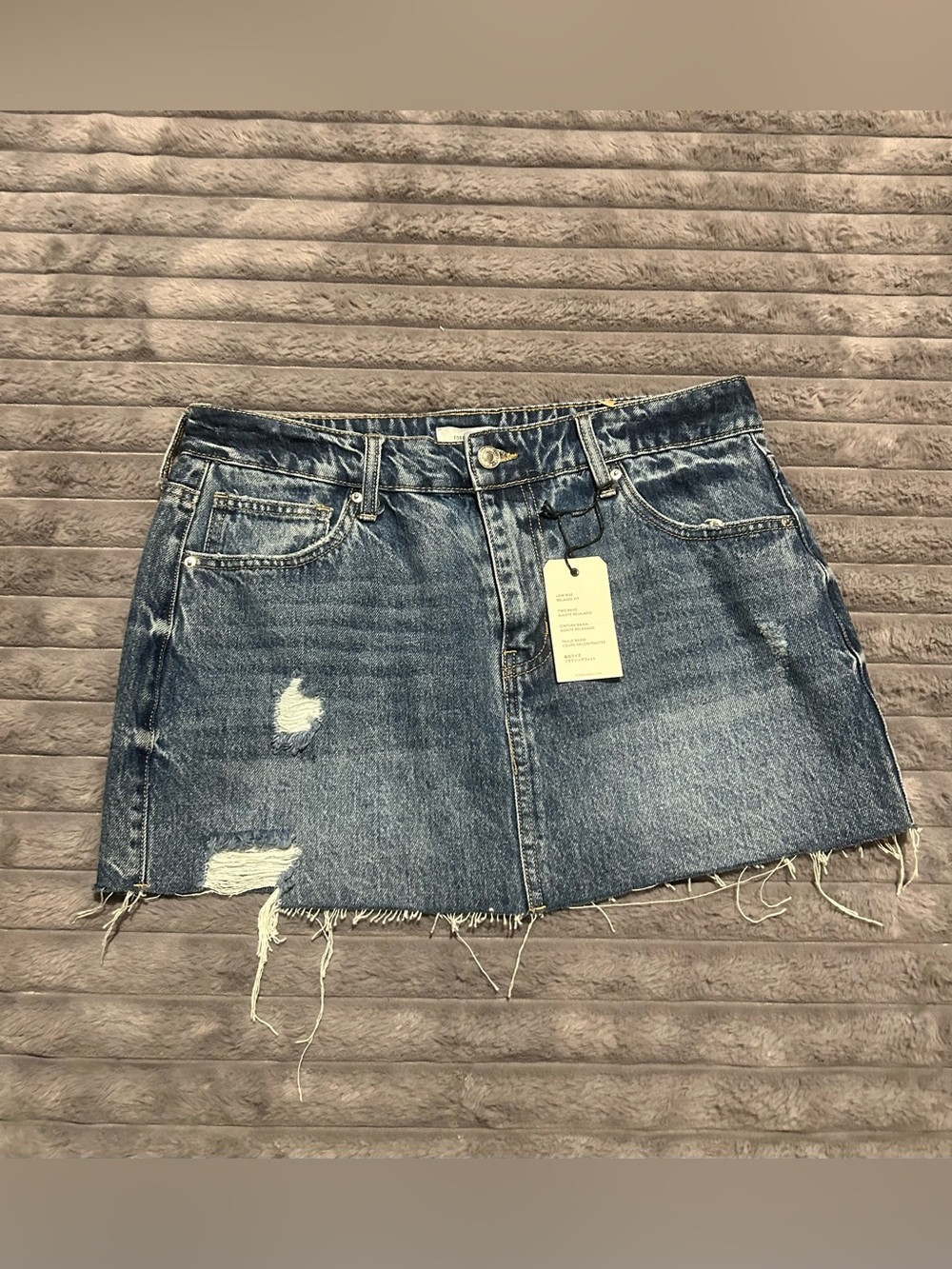 Forever 21 distressed denim with raw hem mini skirt